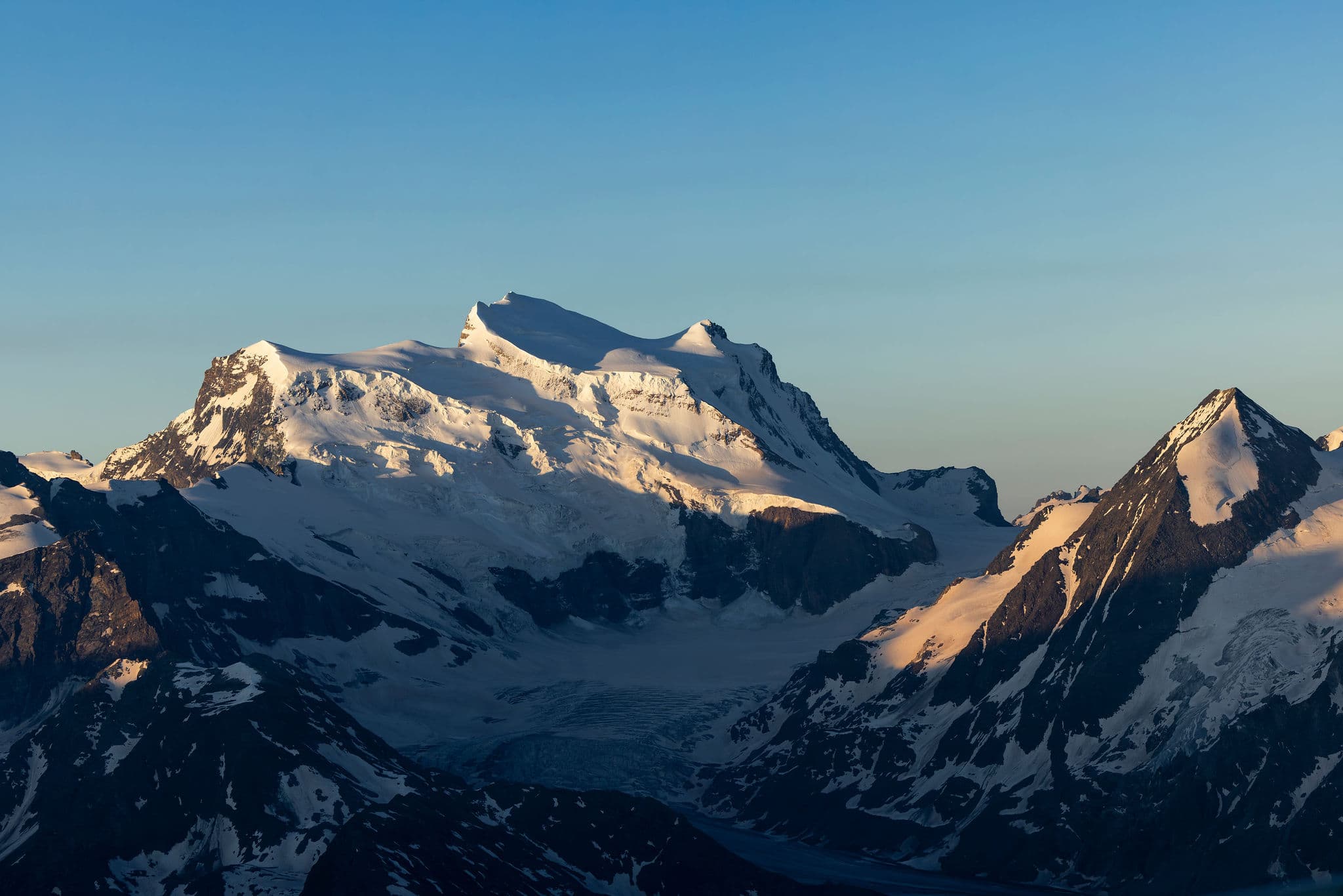 Swiss Alps panoramic landscape at golden hour